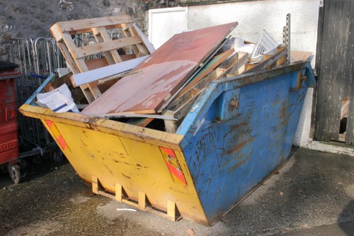 Various types of business waste including paper, plastics, and electronics